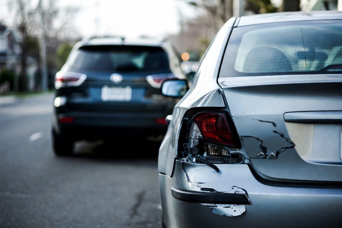 Driver being evaluated for neck and back injuries after a car accident