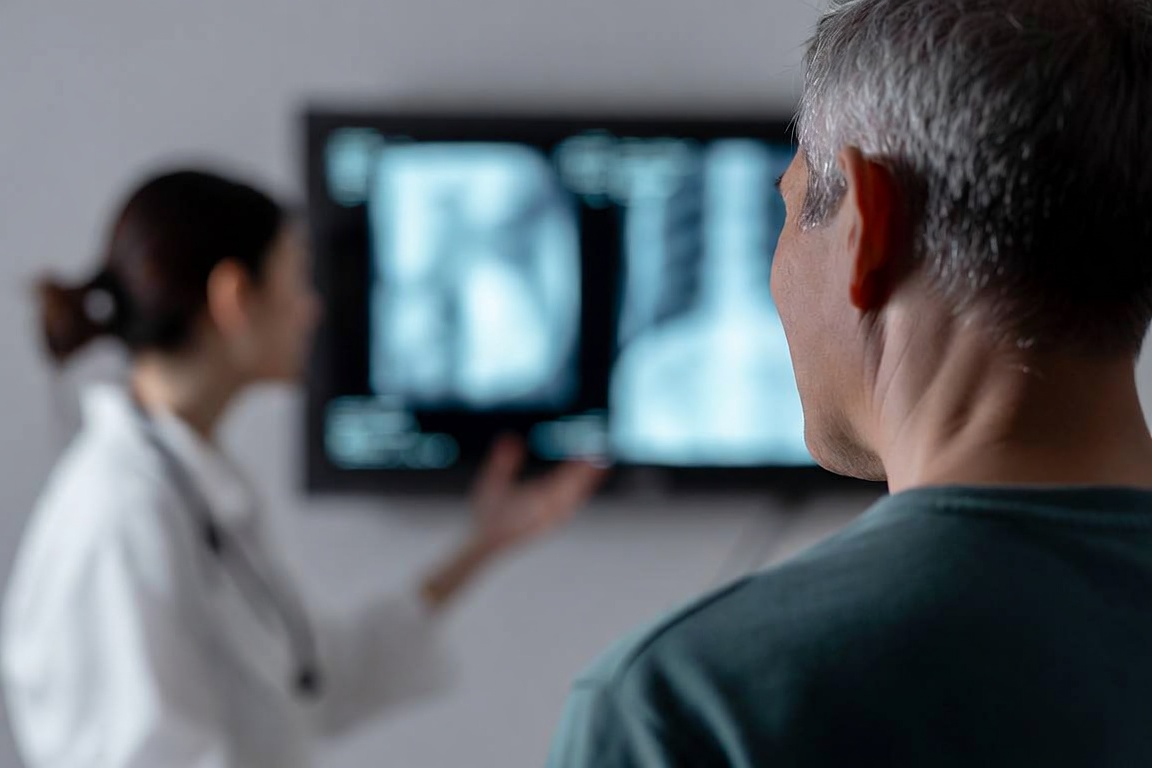 Person meeting with an injury care doctor after a personal injury